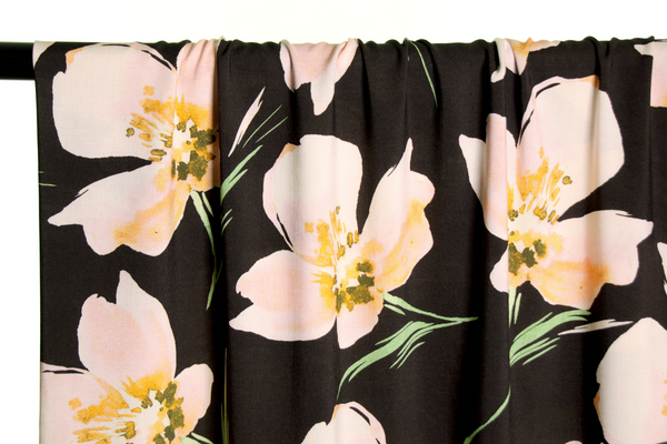 Black viscose with white flowers - €26/m