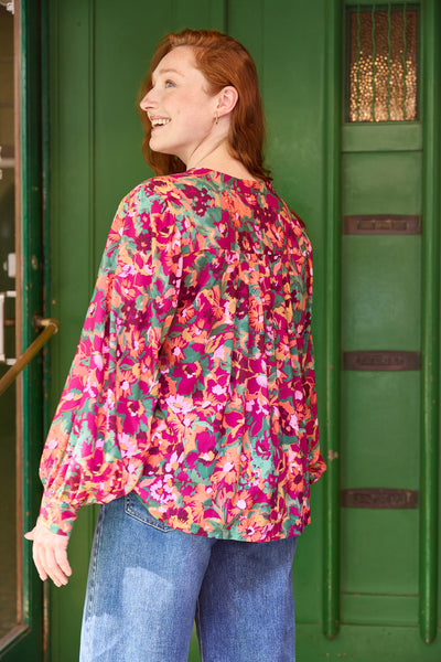 Viscose fuchsia à imprimé fleurs vertes - €26/m