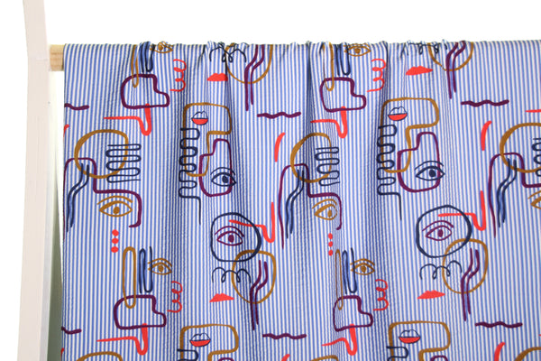 Graphic faces textured viscose - €26/m