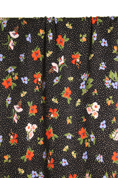 Black cotton with dots and flowers - €26/m
