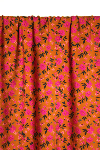 Ochre little flowers textured viscose - €26/m
