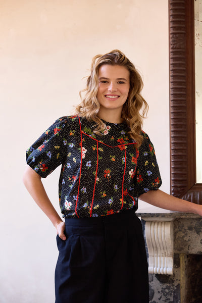 Black cotton with dots and flowers - €26/m